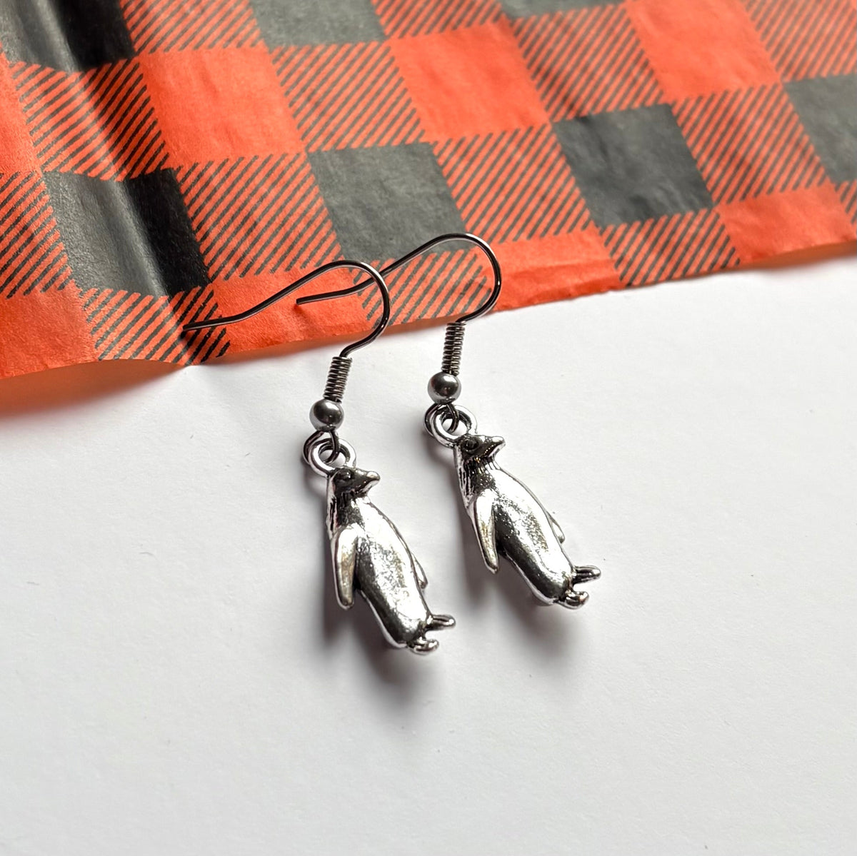 Silver dangle Christmas penguin earrings