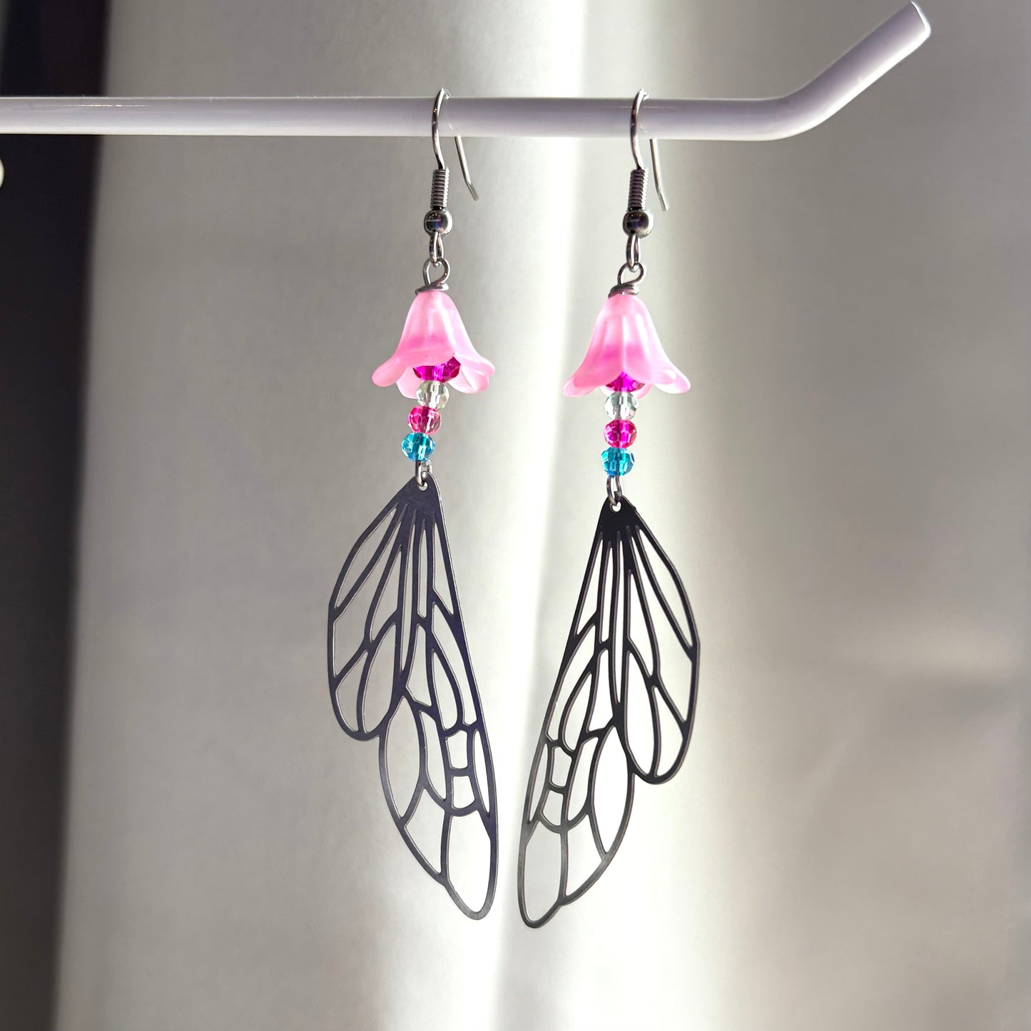 Stainless steel silver fairy wing dangle earrings with pink flowers and colourful beads