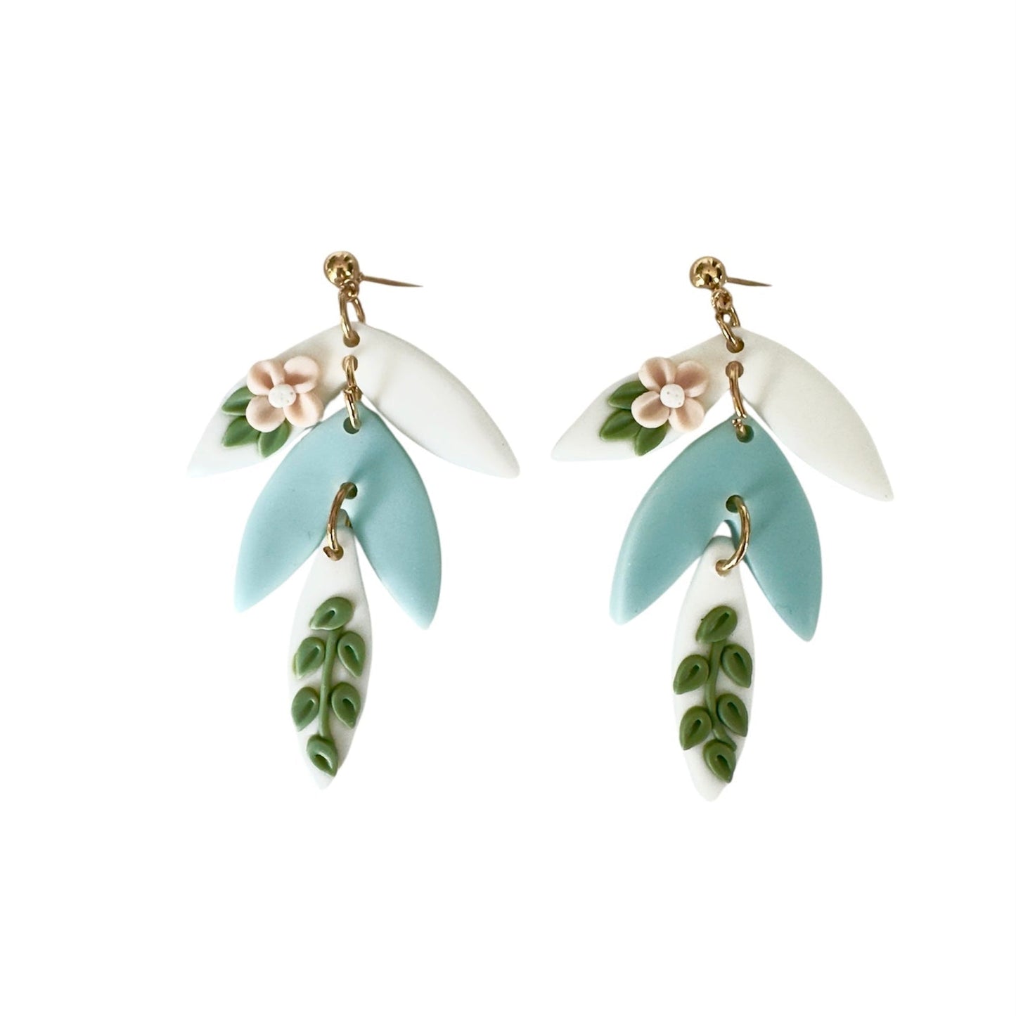 Iris Sky Floral Botanical Statement Drop Earrings with pastel blue petals, white leaves, small flower accents, and green leaf dangles on gold-tone studs