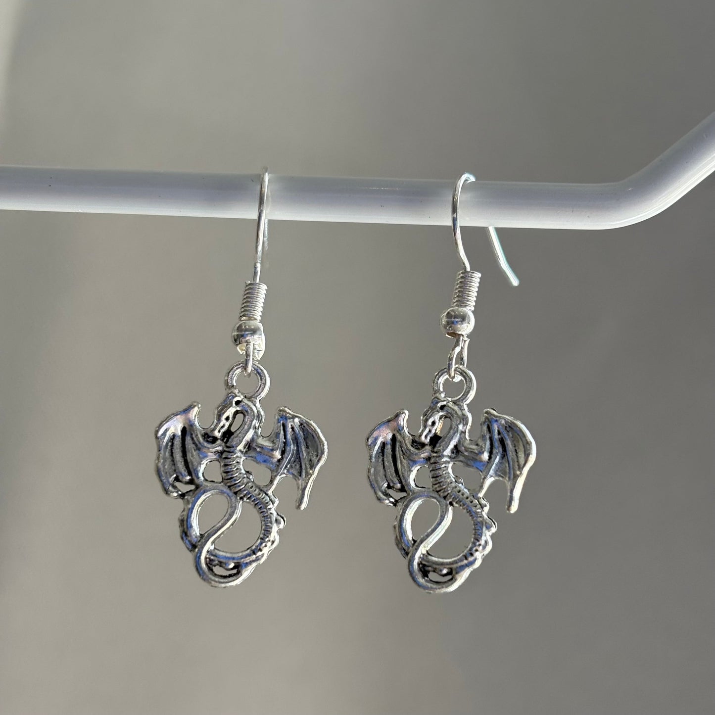 Silver little dragon dangle earrings