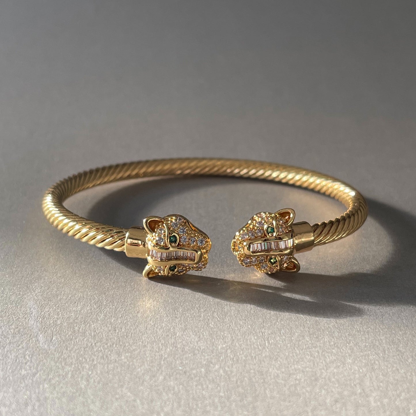 Zuri Gold Textured Panther Cuff bracelet with panther head design and twisted gold plating