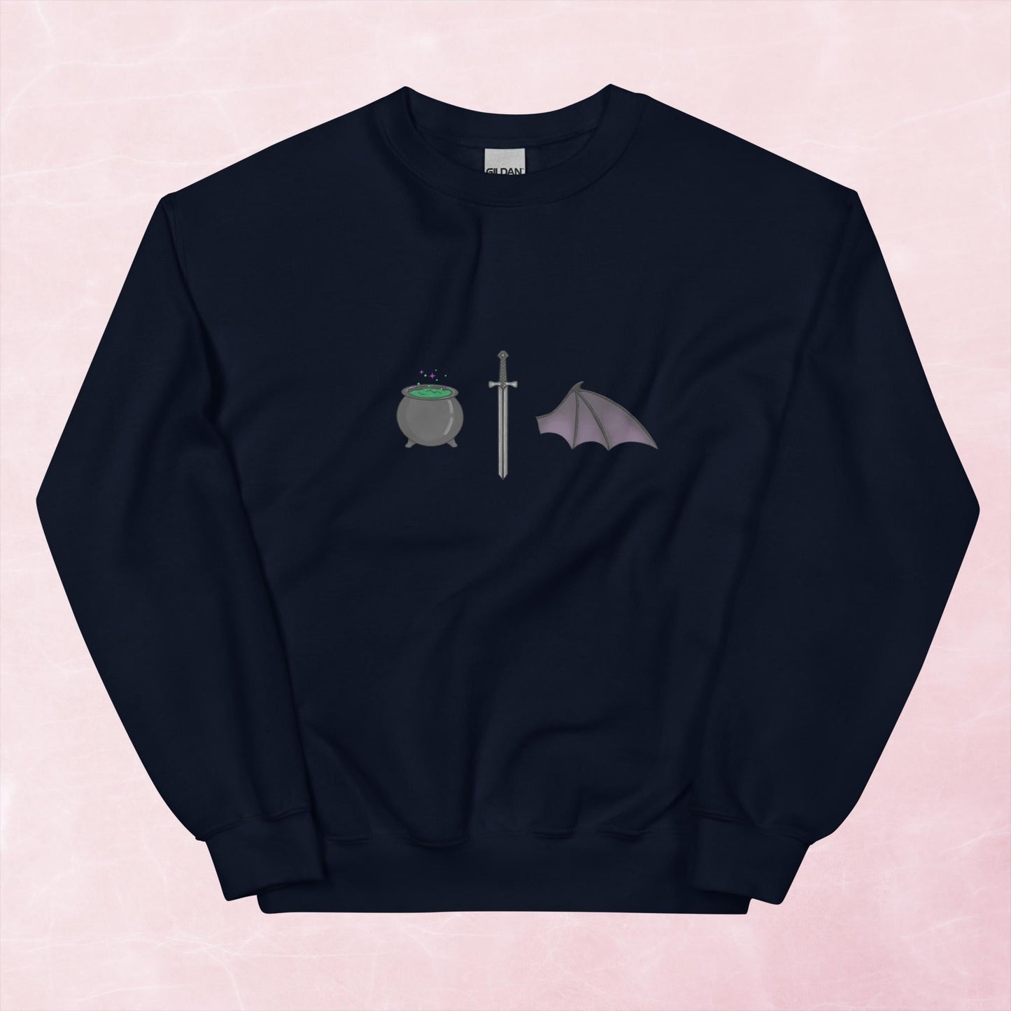 Cool hand illustrated cauldron sword and batwing fantasy book unisex graphic sweatshirt